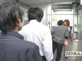 Bizarre Japanese post office offers busty oral xxx film show ATM